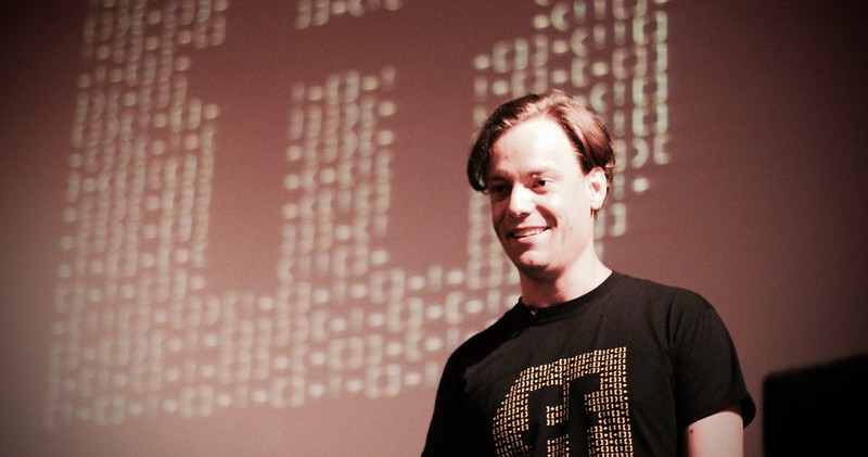 Martin wearing the FFConf 2015 calligram t-shirt, explaining what it does
